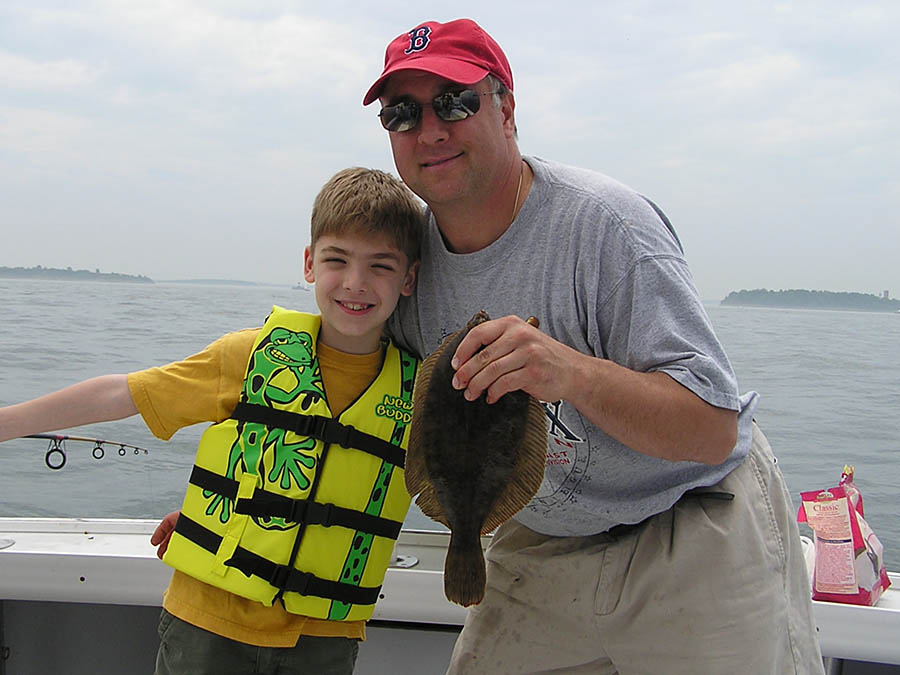 Captain Rob with a young fisherman